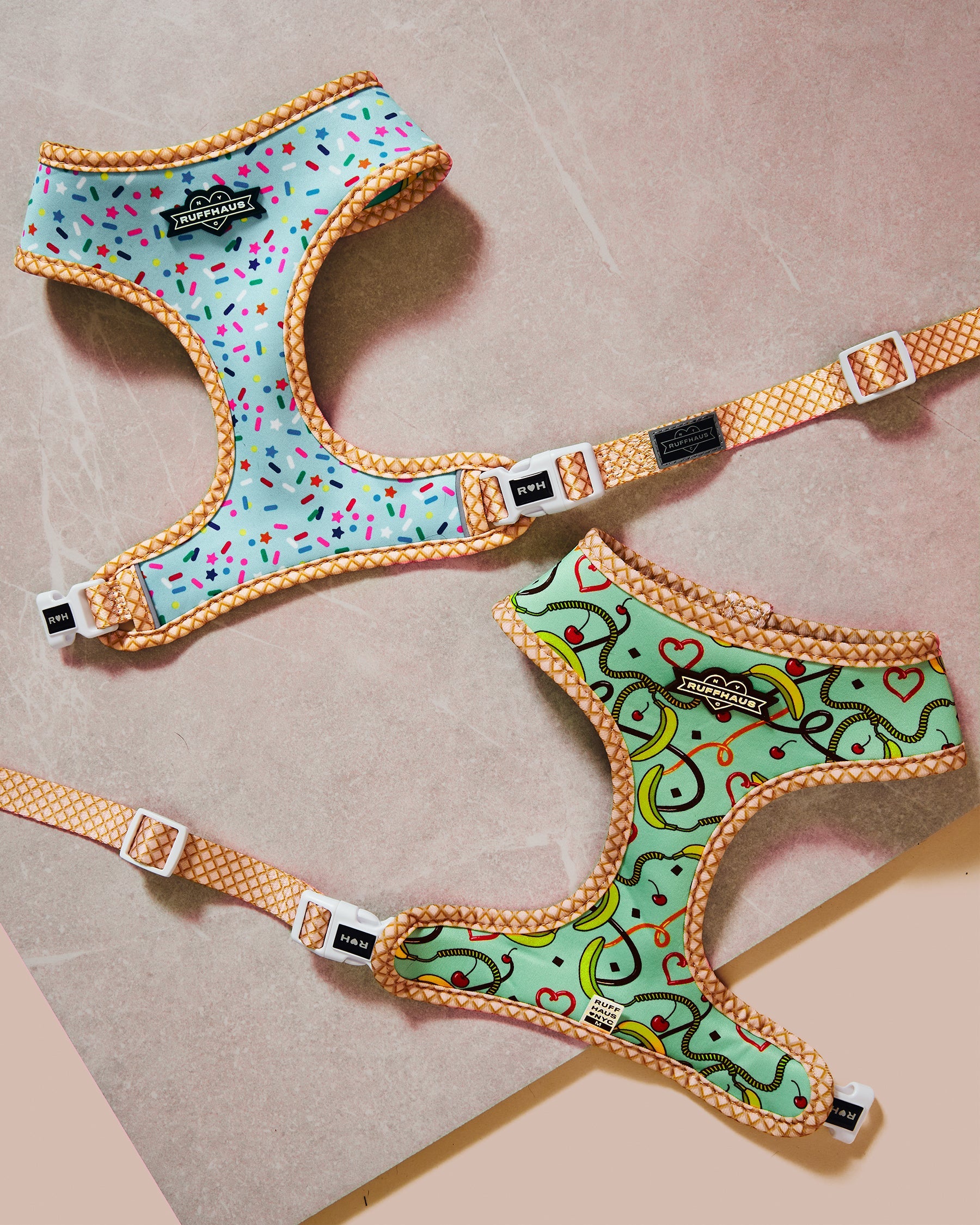 Blue reversible harness by RUFFHAUS NYC featuring adjustable straps and a secure buckle, shown on a pet for versatile styling.