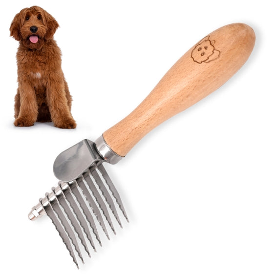 Luna Doodle Boutique dematting rake with ergonomic handle and metal teeth for gentle pet fur detangling and mat removal.