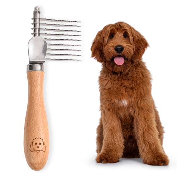Luna Doodle Boutique dematting rake with ergonomic handle and metal teeth for grooming pet mats and tangles.