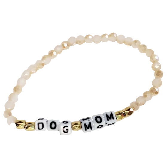 Beaded stretch bracelet for dog moms by Luna Doodle Boutique featuring paw print charms and colorful beads.