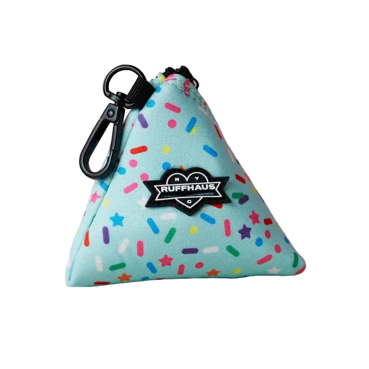 Pink waste bag holder with Luna Doodle Boutique branding, featuring a cute and functional design for pet waste disposal.