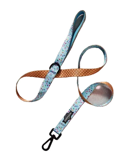 Blue pet leash with white polka dots from Luna Doodle Boutique's Sprinkle Me Blue collection, featuring a comfortable handle and secure clasp.