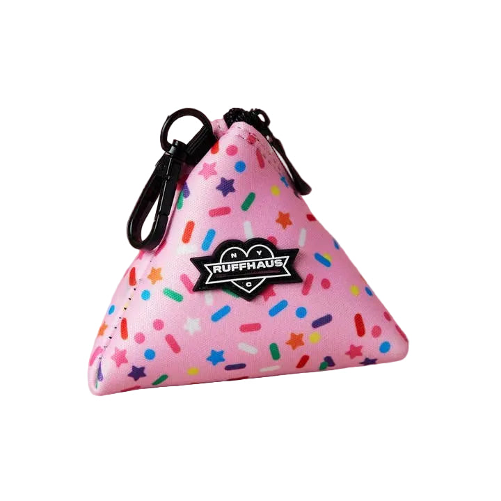 Pink waste bag holder with "Sprinkle Me Pink" design from Luna Doodle Boutique, featuring a cute, decorative accessory for pet owners.