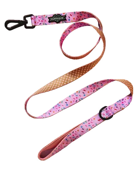 Pink leash with white polka dots from Luna Doodle Boutique's Sprinkle Me Pink collection, designed for stylish dog walking.