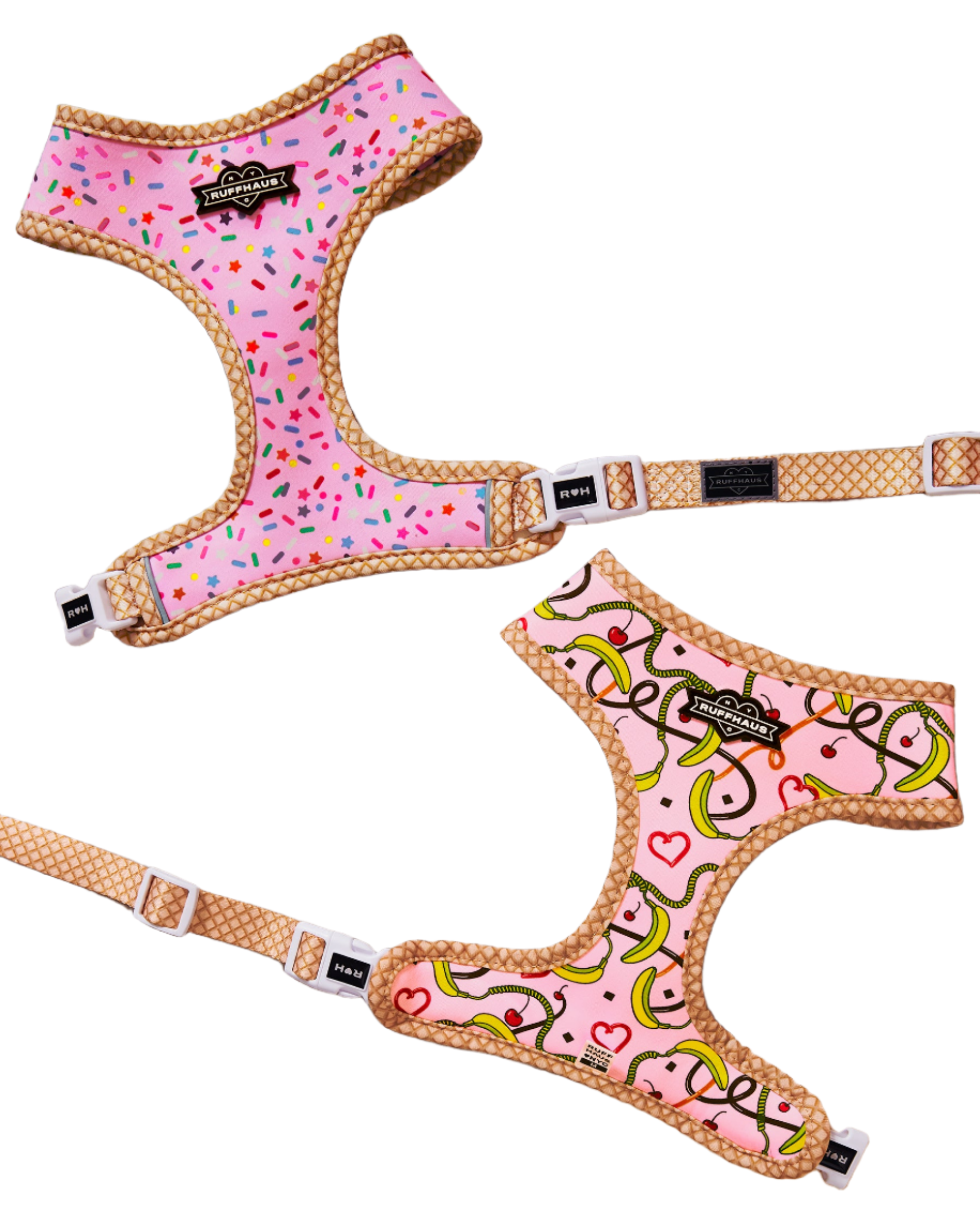 Reversible pink harness for dogs by RUFFHAUS NYC, showcasing adjustable straps and vibrant pink and black sides.