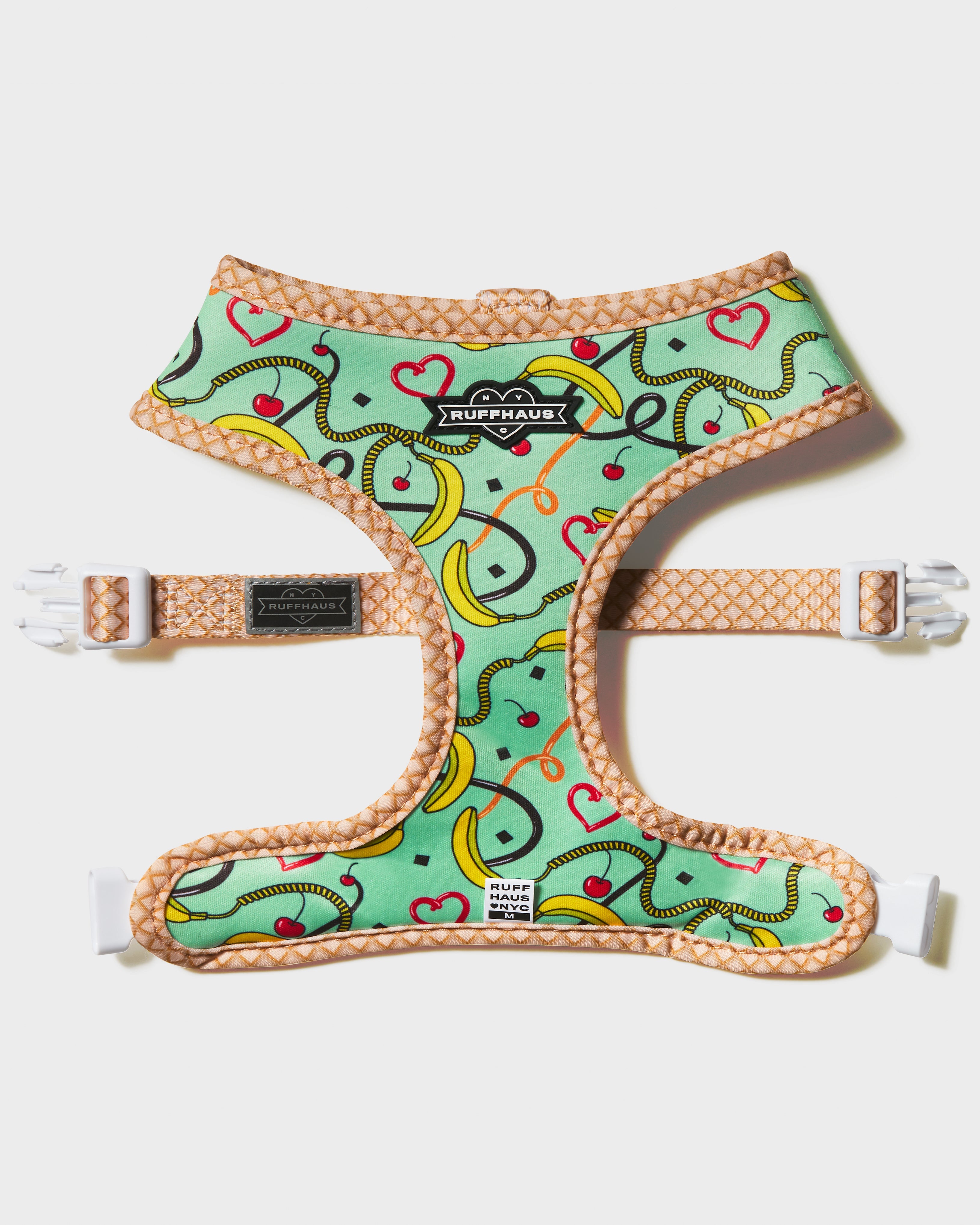 Blue reversible harness by RUFFHAUS NYC featuring adjustable straps and a secure buckle for pets.
