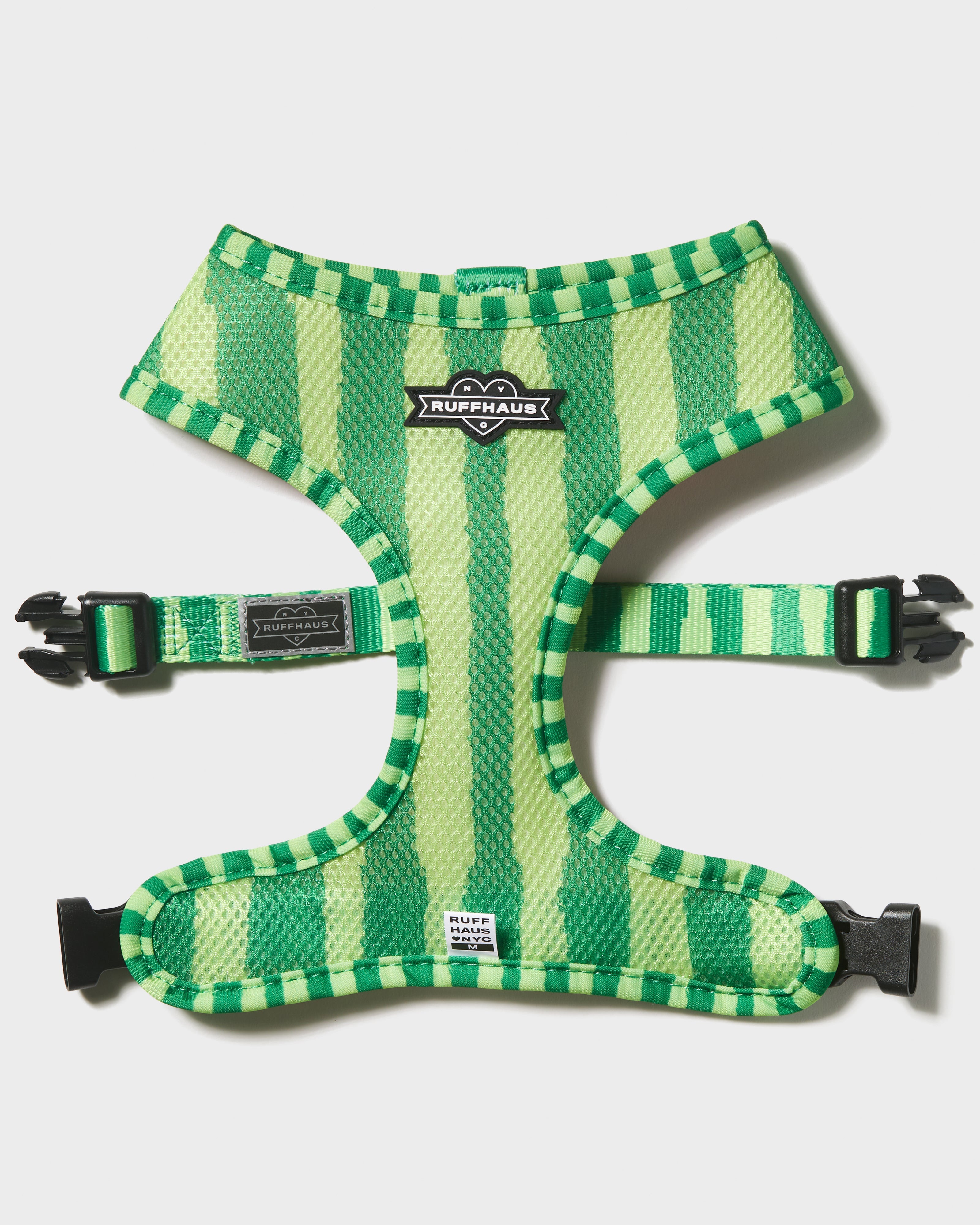 Reversible dog harness from RUFFHAUS NYC featuring colorful watermelon design and adjustable straps.