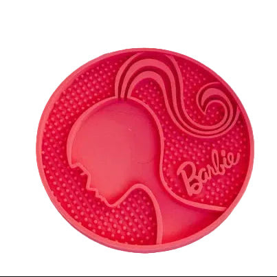 Dog lick mat featuring Barbie design by Luna Doodle Boutique, textured silicone surface for engaging pet activity.