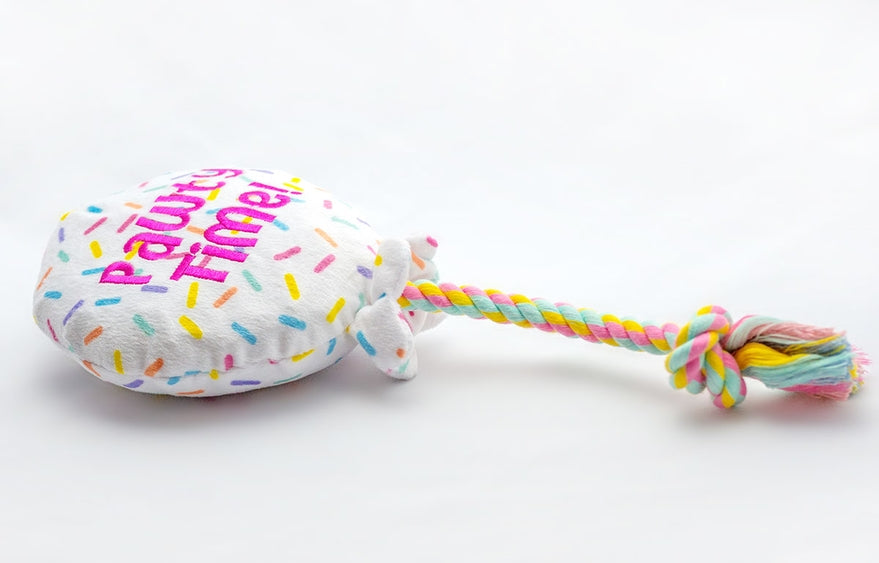 Luna Doodle Boutique birthday balloon plush dog toy with colorful balloon design, soft and cuddly for playful pets.